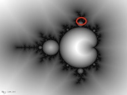 Mathematical artwork. A black and white picture (with ellipse detail) of the Mandelbrot fractal set.