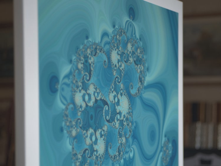 Mathematical art. A close-up of a canvas fine art print of the blue and turquoise fractal CD0, a Julia and Fatou set.